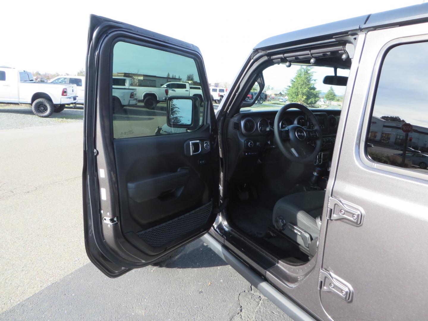 2023 CHARCOAL /black Jeep Wrangler Unlimited Willys 4XE (1C4JJXN68PW) with an 2.0L L4 DOHC 16V HYBRID engine, 8A transmission, located at 2630 Grass Valley Highway, Auburn, CA, 95603, (530) 508-5100, 38.937893, -121.095482 - 3" Zone Offroad lift kit, Fox Adventure series shocks, 17" Method Race wheels, 37" BFG KO2 tires, and a Teraflex spare tire carrier. - Photo#12